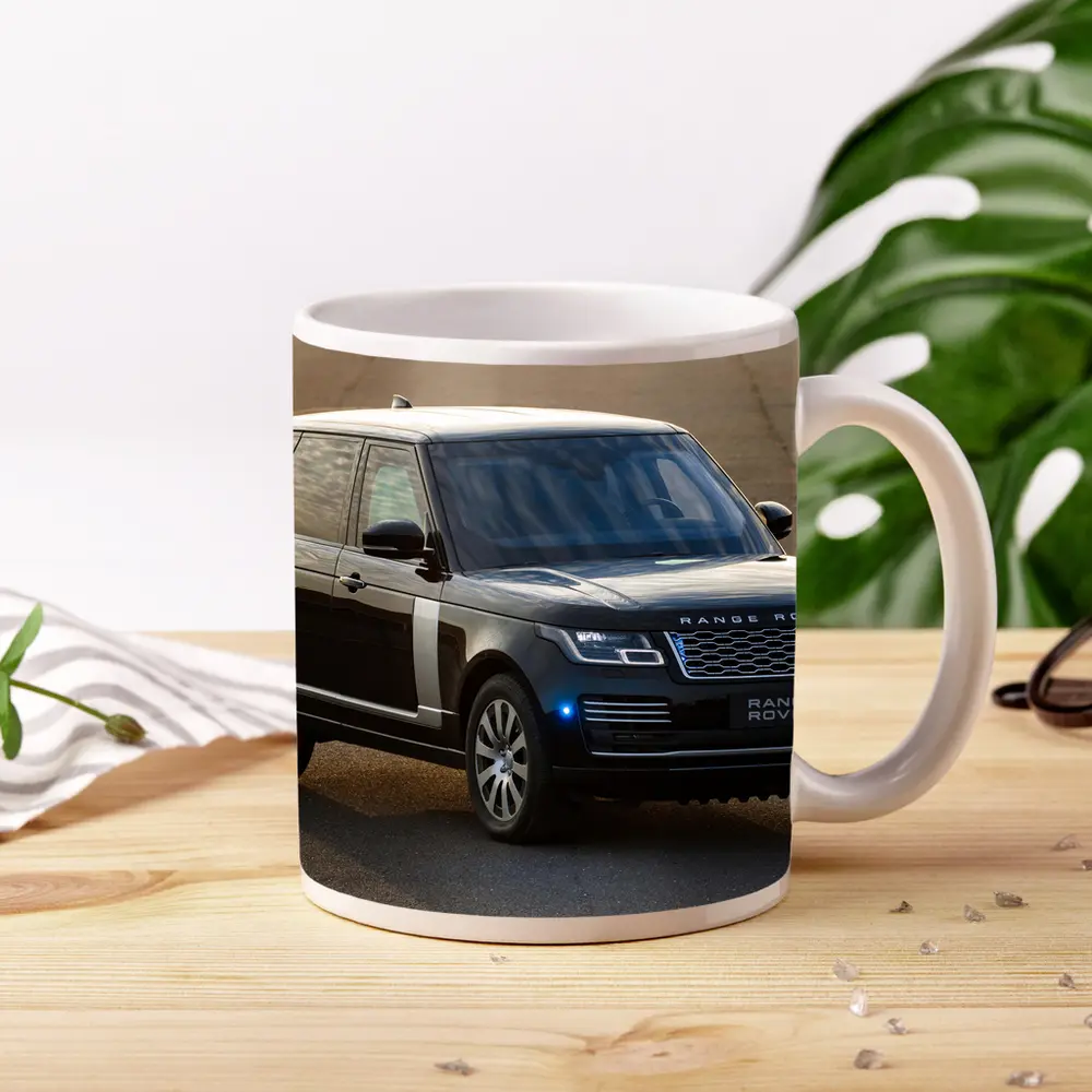 Range Rover Sentinel Black SUV Parked Outdoors – Mugs