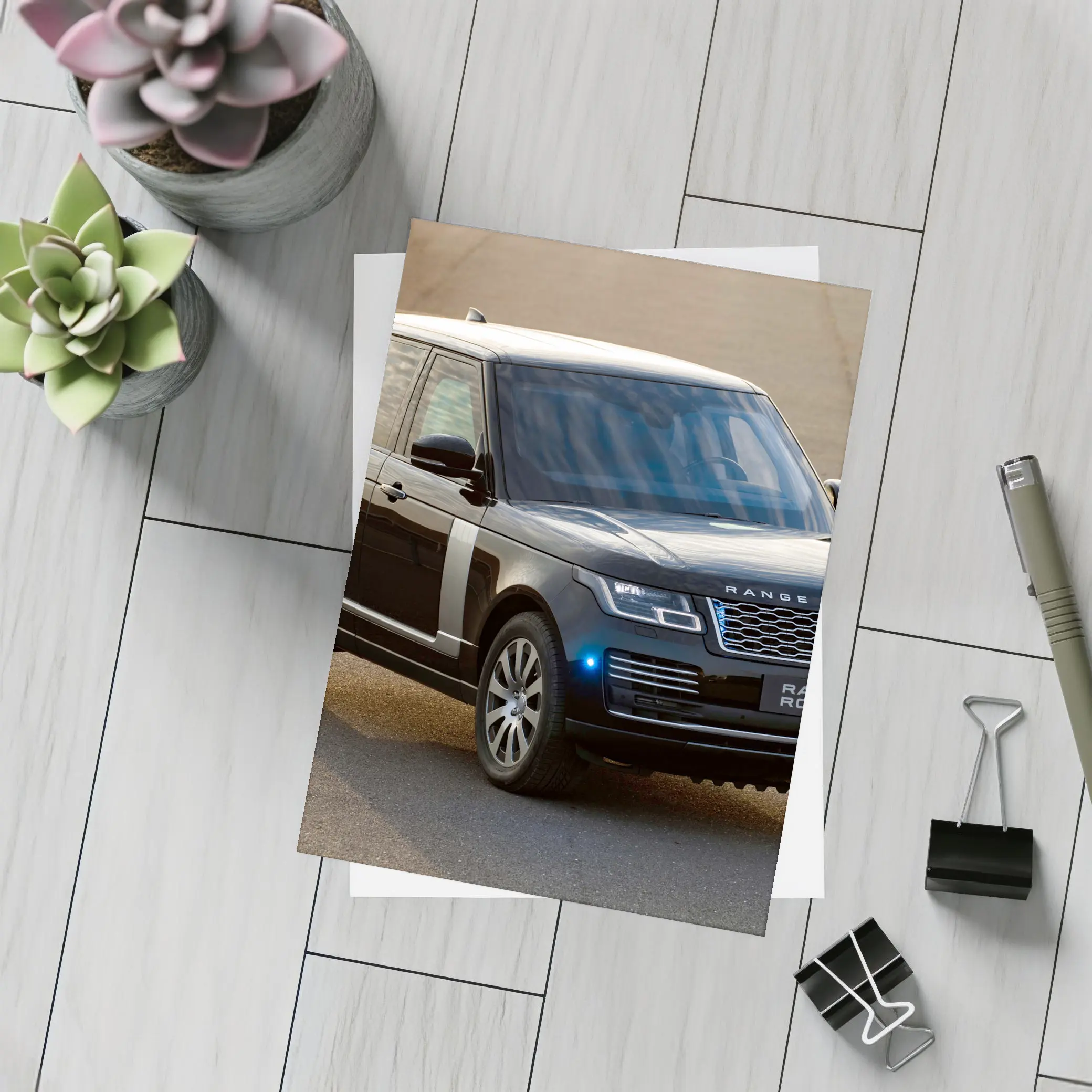 Range Rover Sentinel Black SUV Parked Outdoors – Postcards