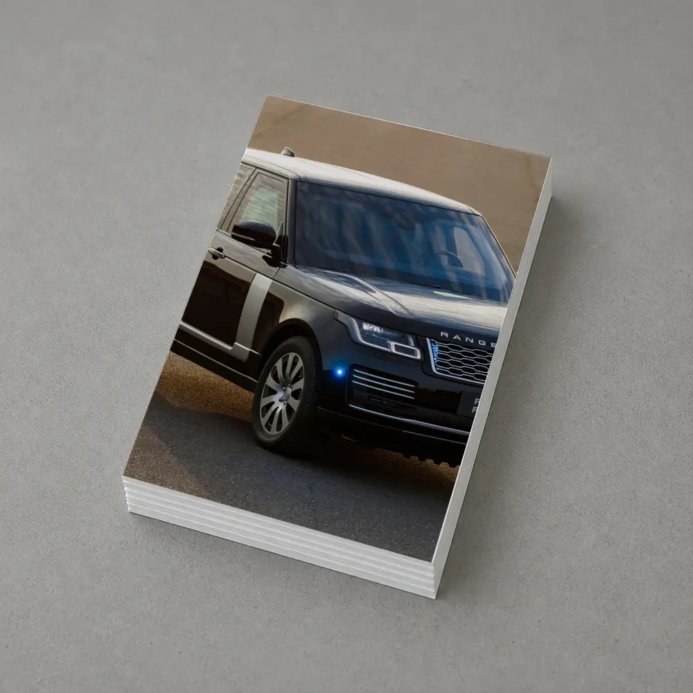 Range Rover Sentinel Black SUV Parked Outdoors – Postcards