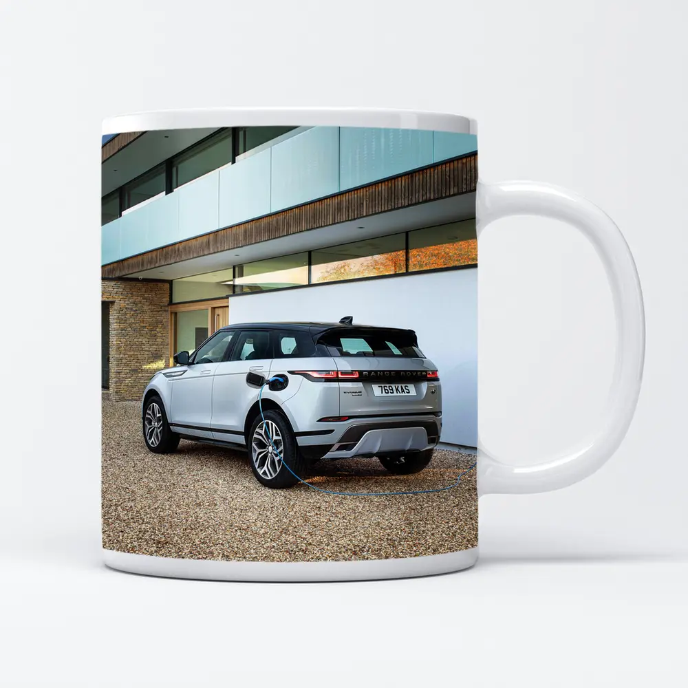 Range Rover Evoque Charging At Modern House – Mugs