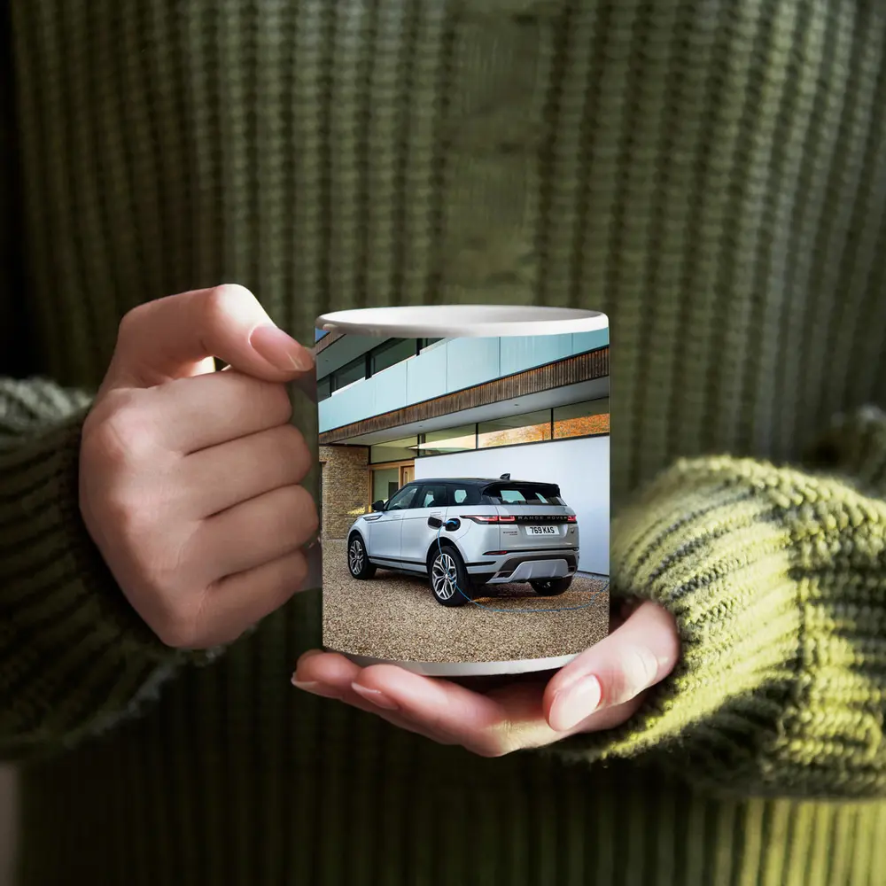 Range Rover Evoque Charging At Modern House – Mugs