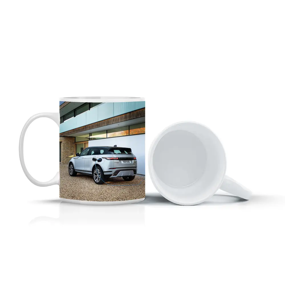 Range Rover Evoque Charging At Modern House – Mugs