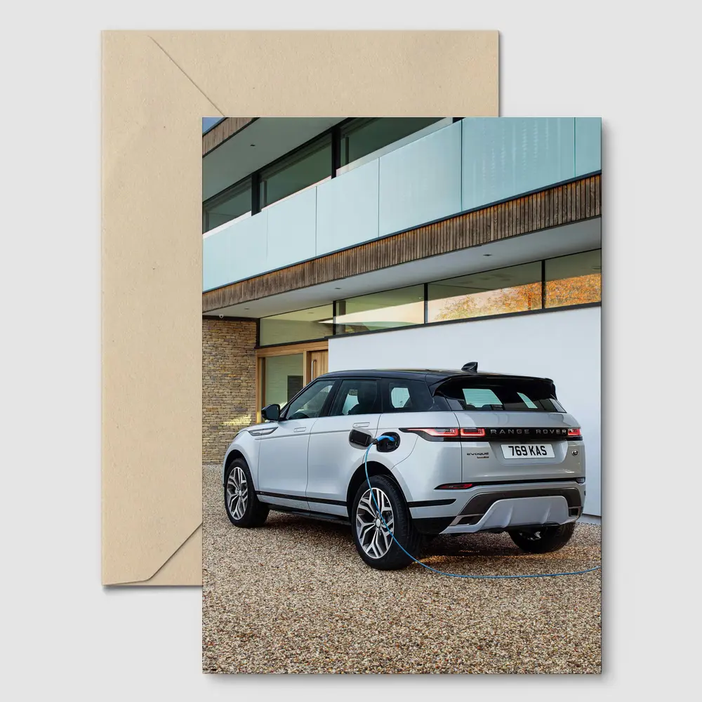 Range Rover Evoque Charging At Modern House – Postcards
