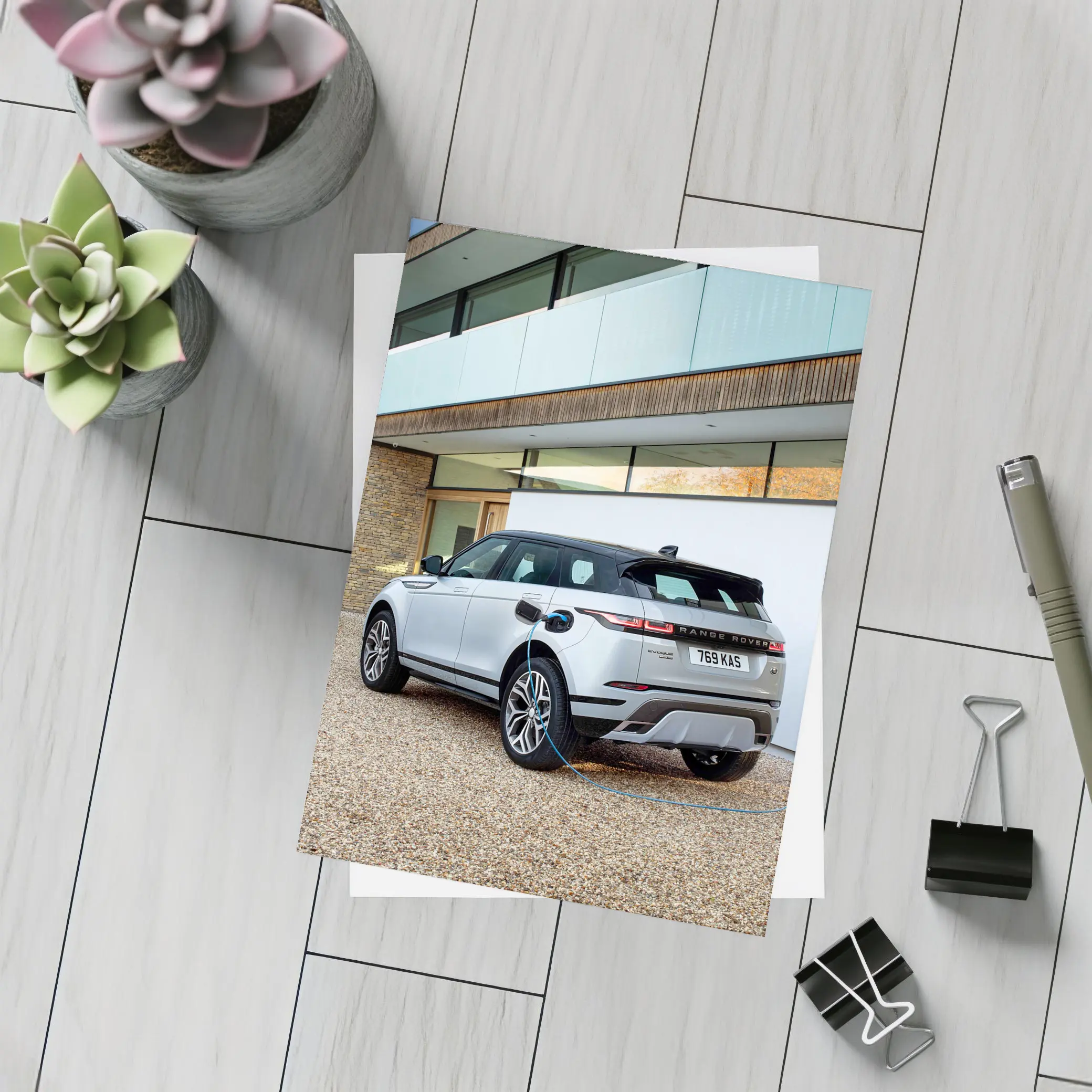 Range Rover Evoque Charging At Modern House – Postcards