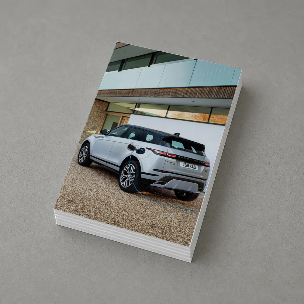 Range Rover Evoque Charging At Modern House – Postcards