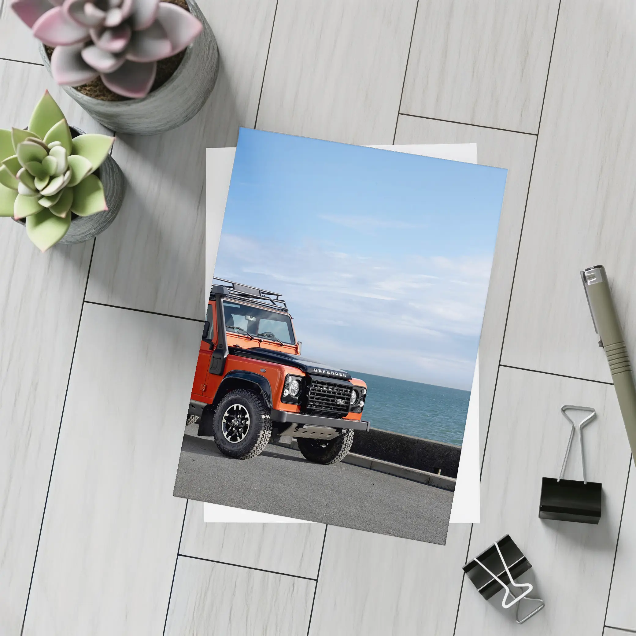 Land Rover Defender Orange Coastal Road Scene – Postcards