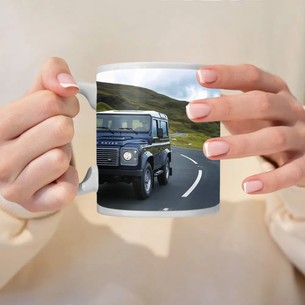 Land Rover Defender Rolling Through Highland Roads – Mugs