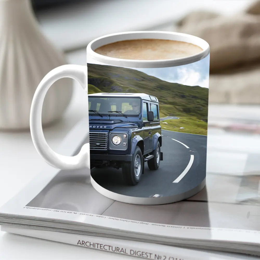 Land Rover Defender Rolling Through Highland Roads – Mugs