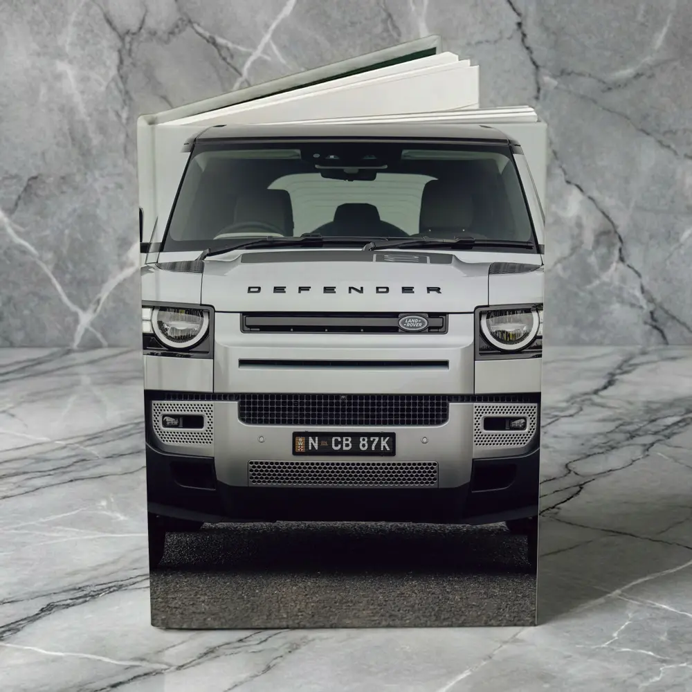 Land Rover Defender Front View Road Background – Notebooks