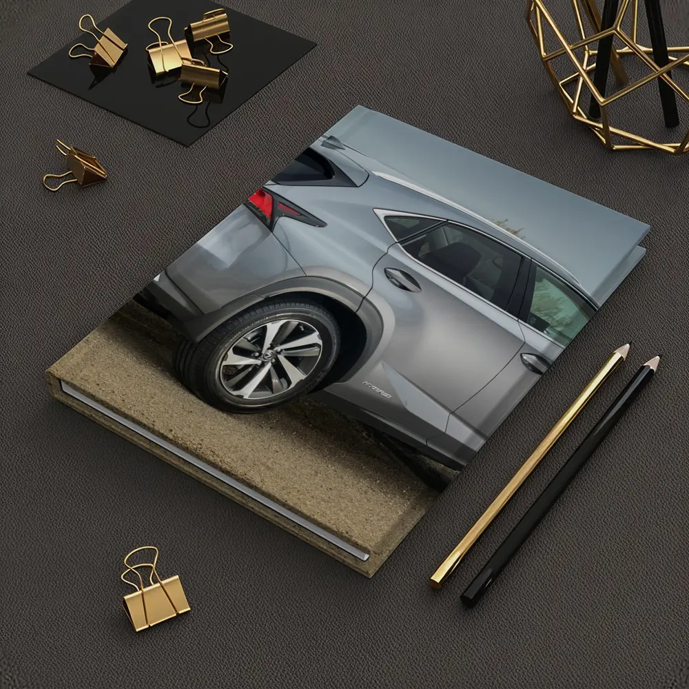 Lexus NX Hybrid Silver SUV Coastal Setting – Notebooks
