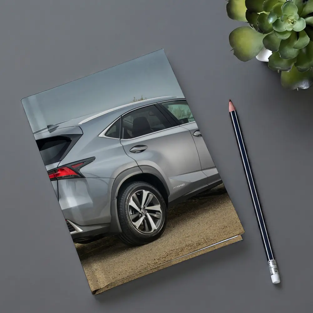 Lexus NX Hybrid Silver SUV Coastal Setting – Notebooks