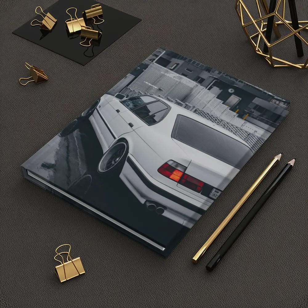 BMW E34 White Sedan Rainy Urban Street – Notebooks