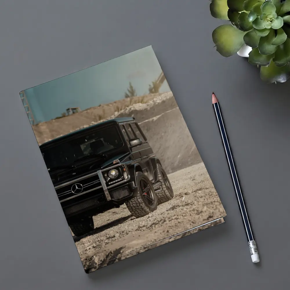 Mercedes G Wagon Black on Sandy Ground – Notebooks