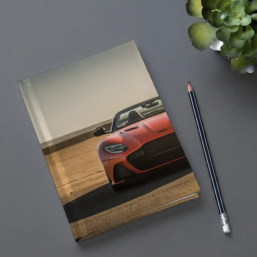 Aston Martin DBS Superleggera Orange Beach Front – Notebooks
