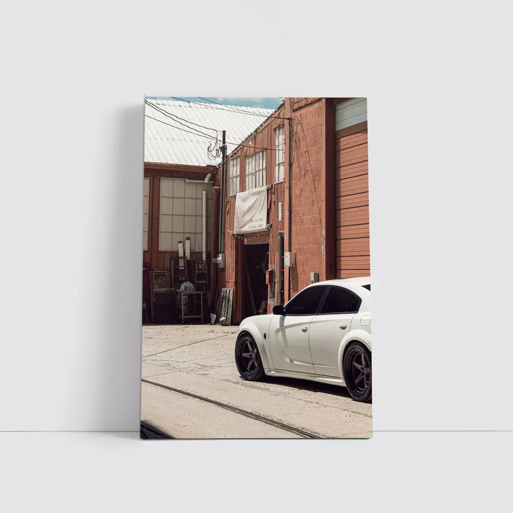 White Dodge Charger Parked Near Industrial Building – Wall Art