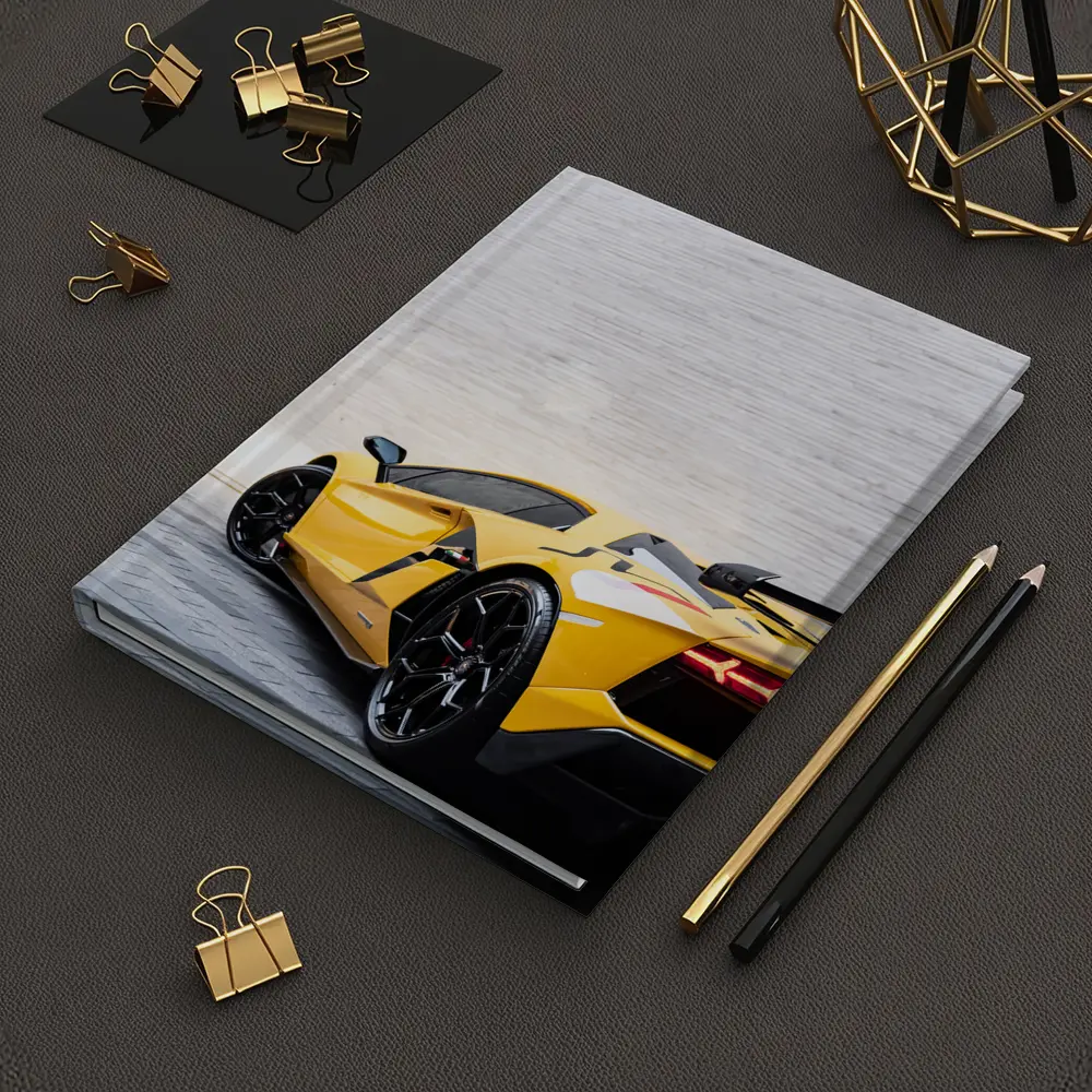 Lamborghini Aventador Yellow Against Concrete Wall – Notebooks