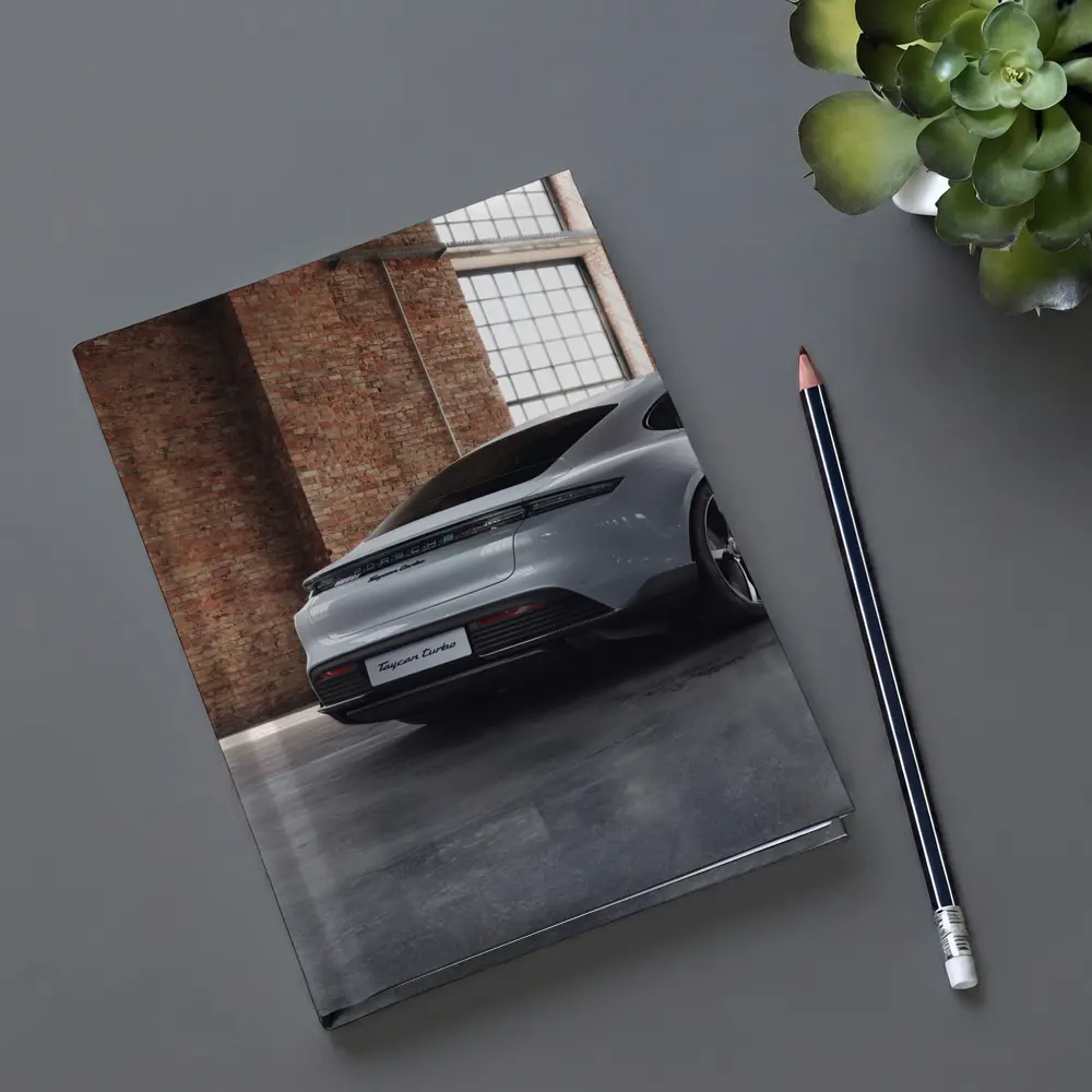 Porsche Taycan Turbo Industrial Garage Setting – Notebooks