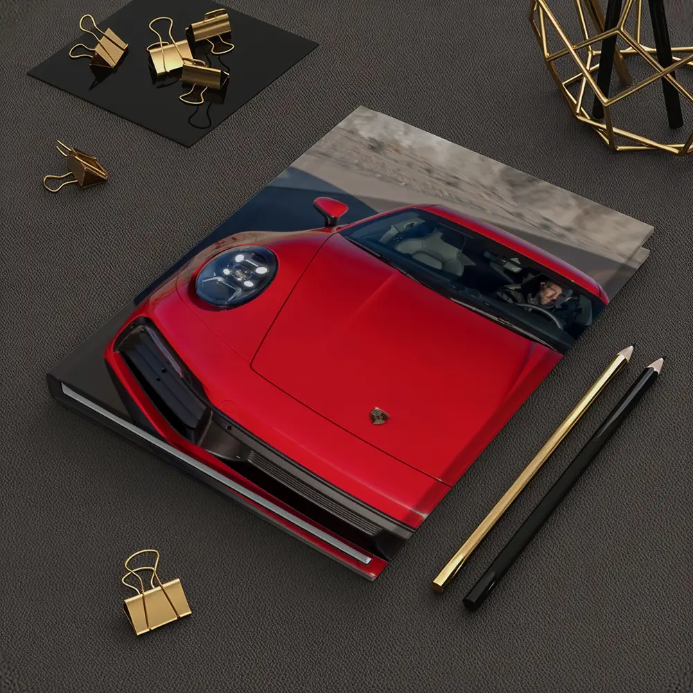 Red Porsche 911 on Mountain Road – Notebooks