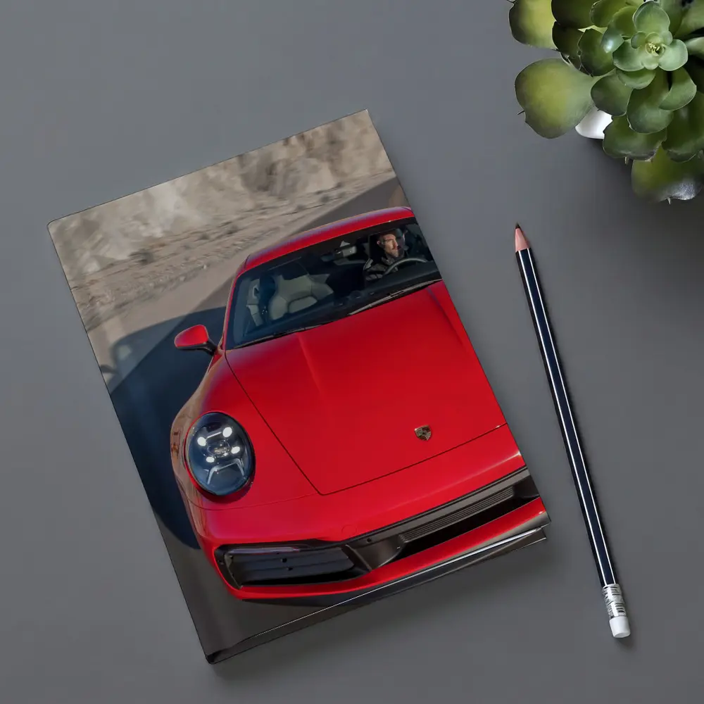 Red Porsche 911 on Mountain Road – Notebooks