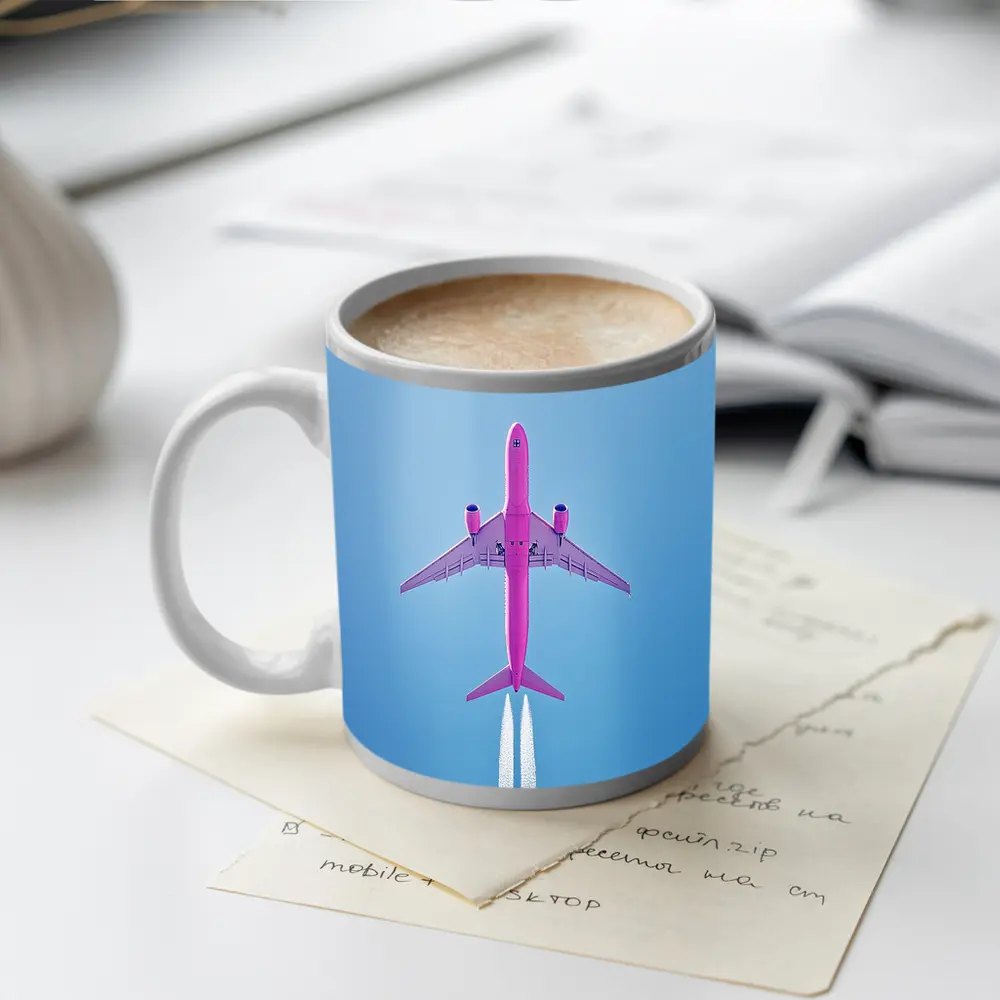 Pink Airplane Flying Against Blue Sky – Mugs
