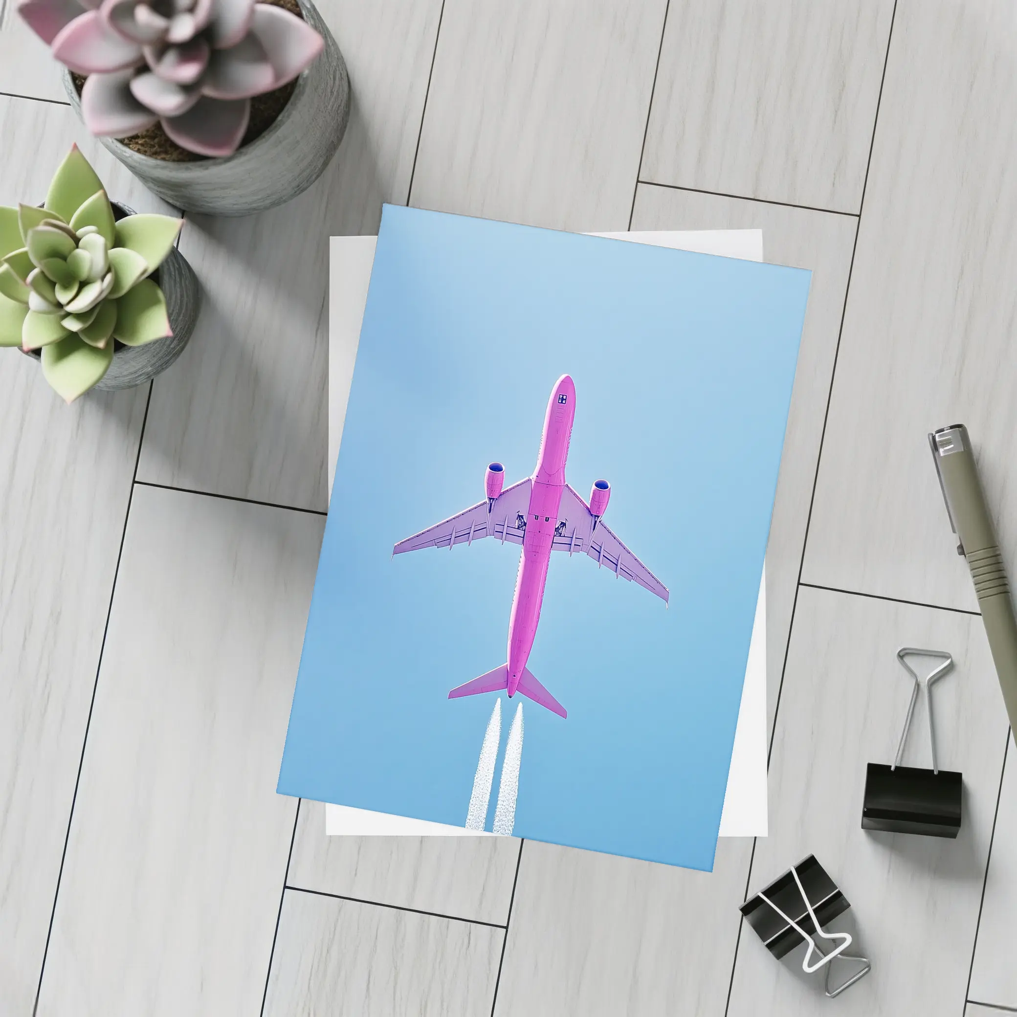 Pink Airplane Flying Against Blue Sky – Postcards
