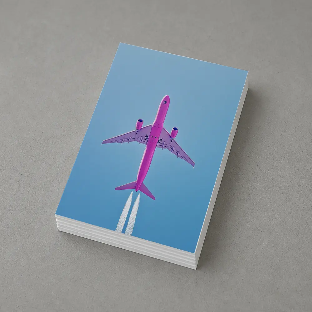Pink Airplane Flying Against Blue Sky – Postcards
