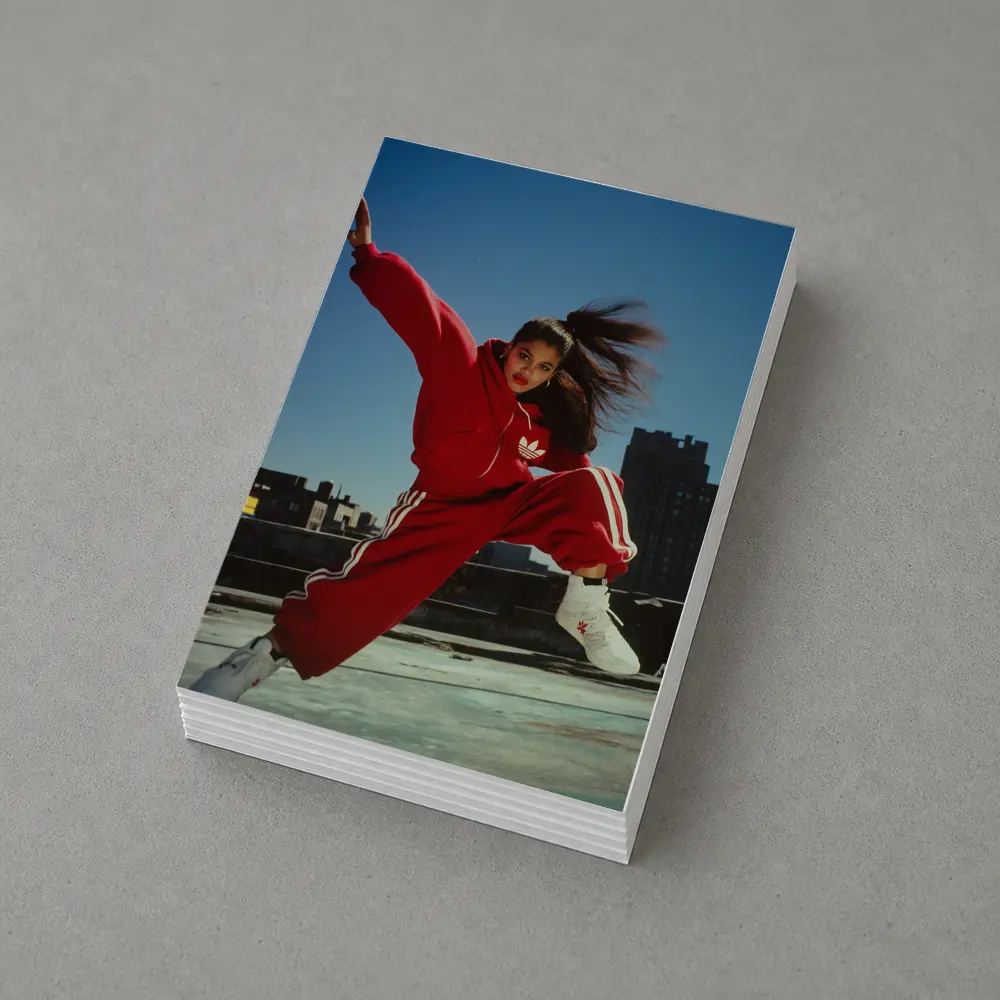 Red Adidas Tracksuit Girl Jumping City Rooftop – Postcards