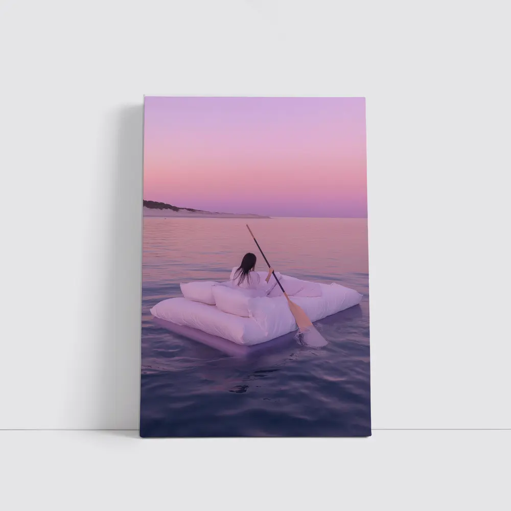 Woman Floating on Raft at Pink Sunset – Wall Art