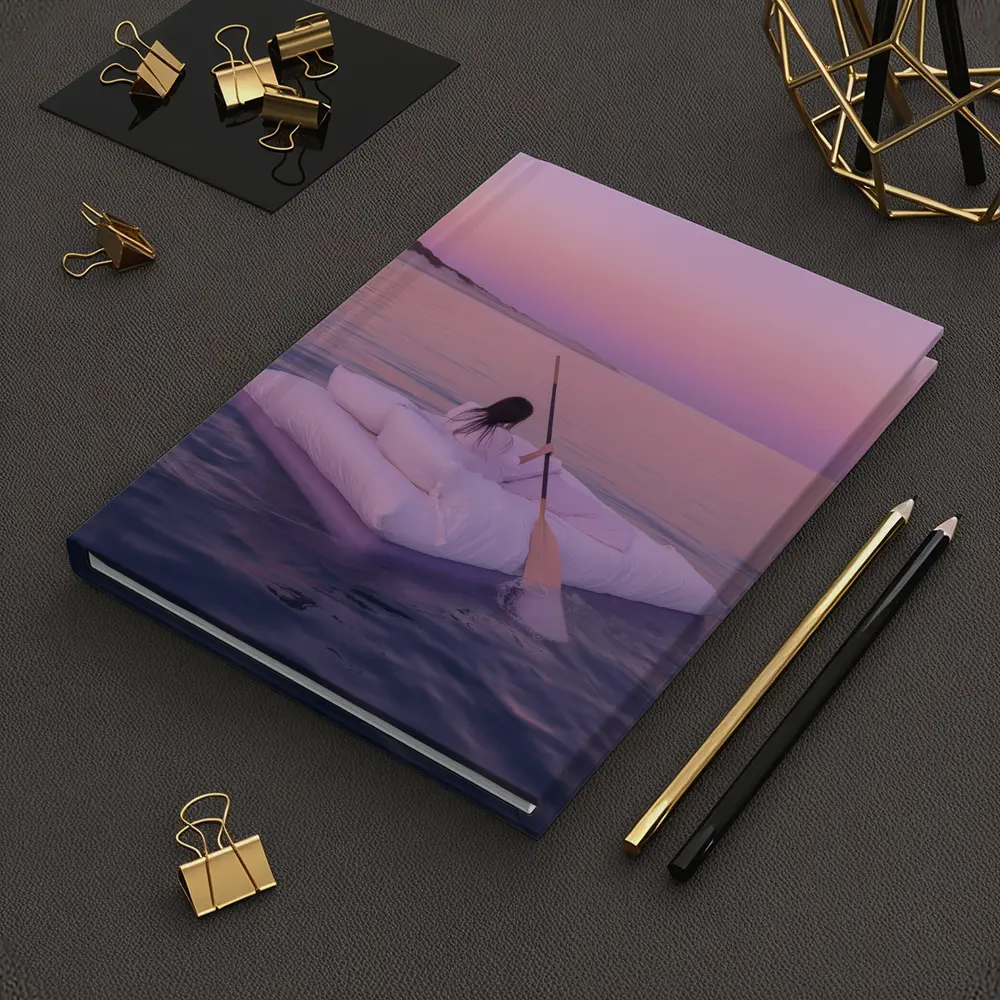 Woman Floating on Raft at Pink Sunset – Notebooks