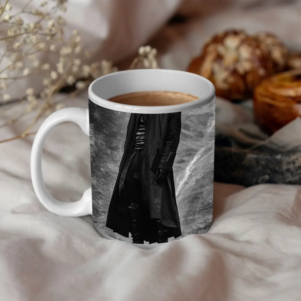 Black Coat Man Standing Rocky Landscape – Mugs