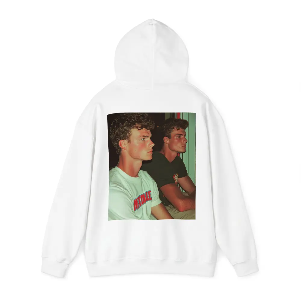 Two Young Men Sitting Together Indoors – Hoodies