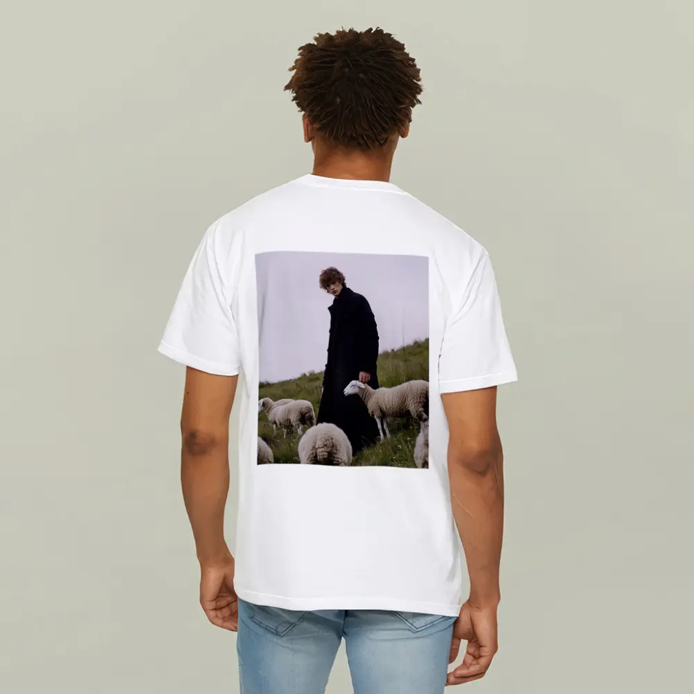 Young Man Black Coat Sheep Green Field – T-Shirts
