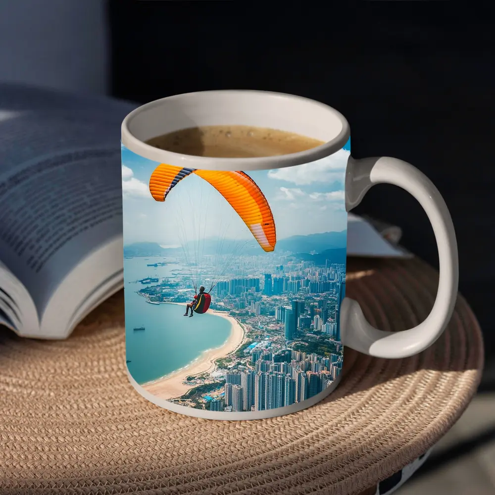 Paraglider Soaring Over Coastal City Skyline – Mugs