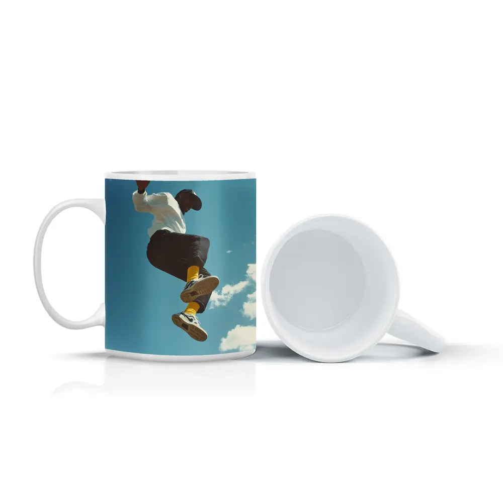 Man Jumping High Against Blue Sky – Mugs