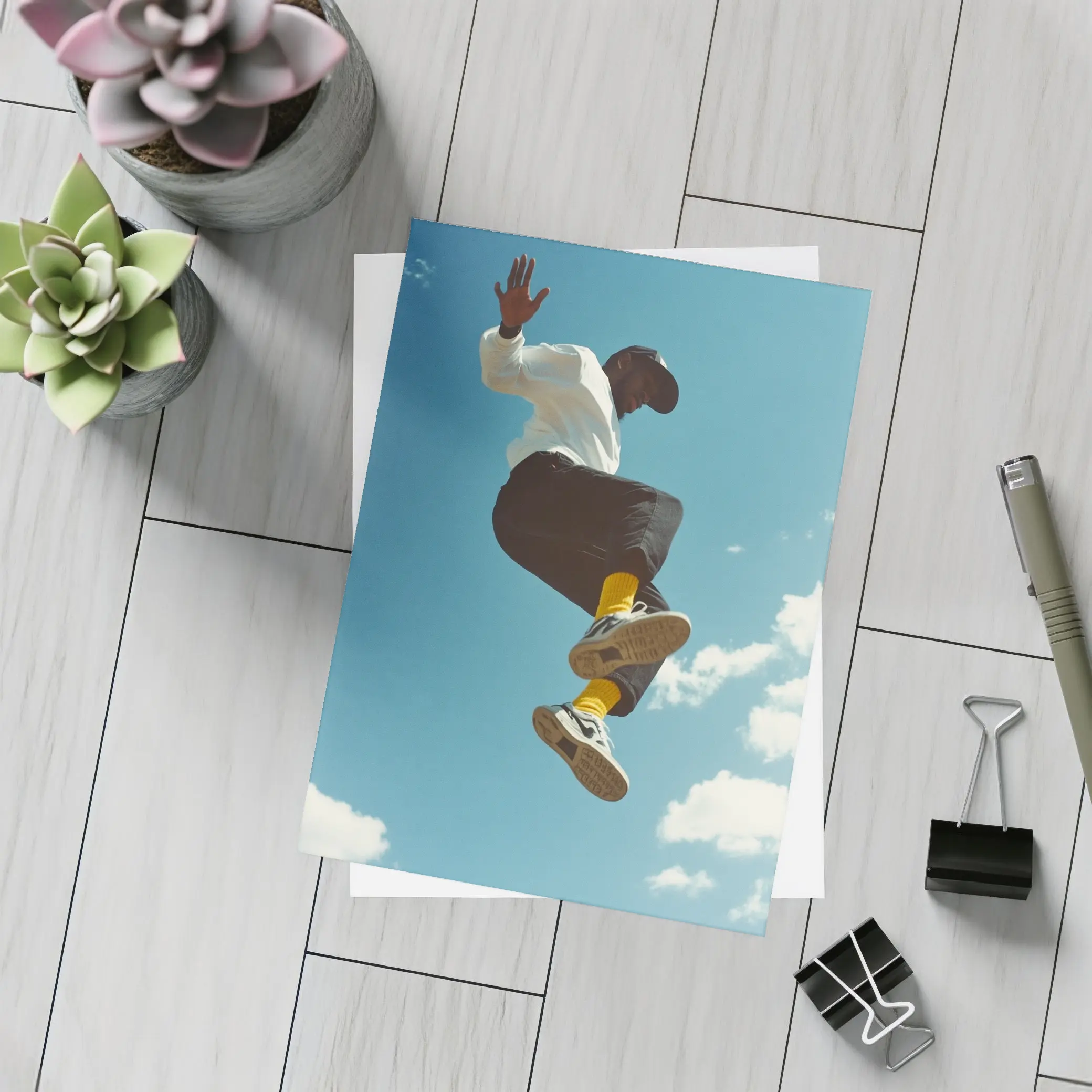 Man Jumping High Against Blue Sky – Postcards