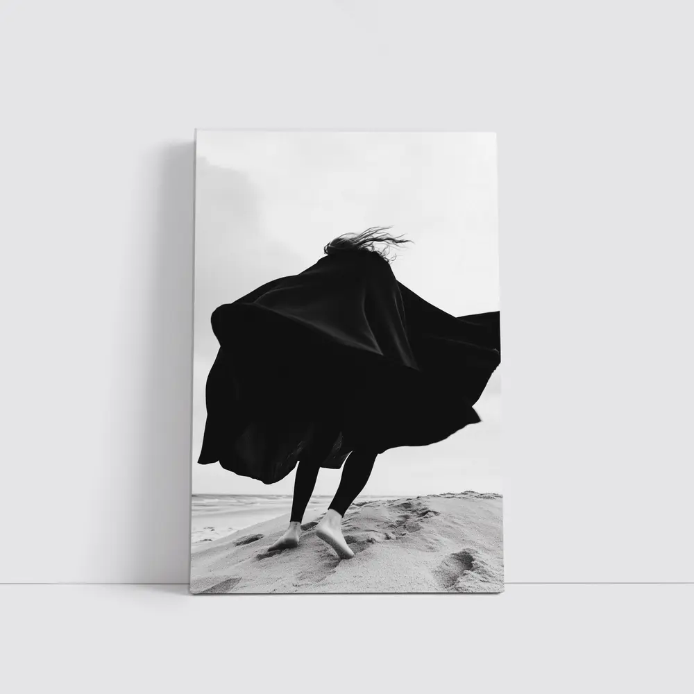 Woman Black Cape Flying Beach Sand – Wall Art