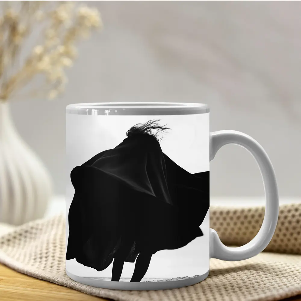 Woman Black Cape Flying Beach Sand – Mugs