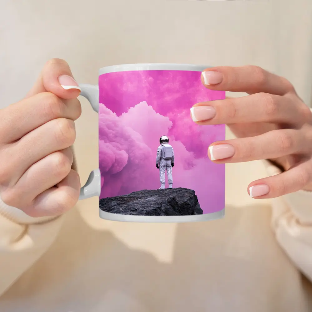 Astronaut Standing On Rock Pink Sky – Mugs