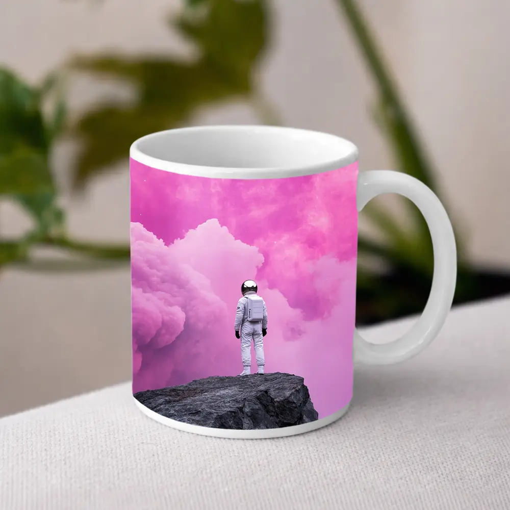 Astronaut Standing On Rock Pink Sky – Mugs