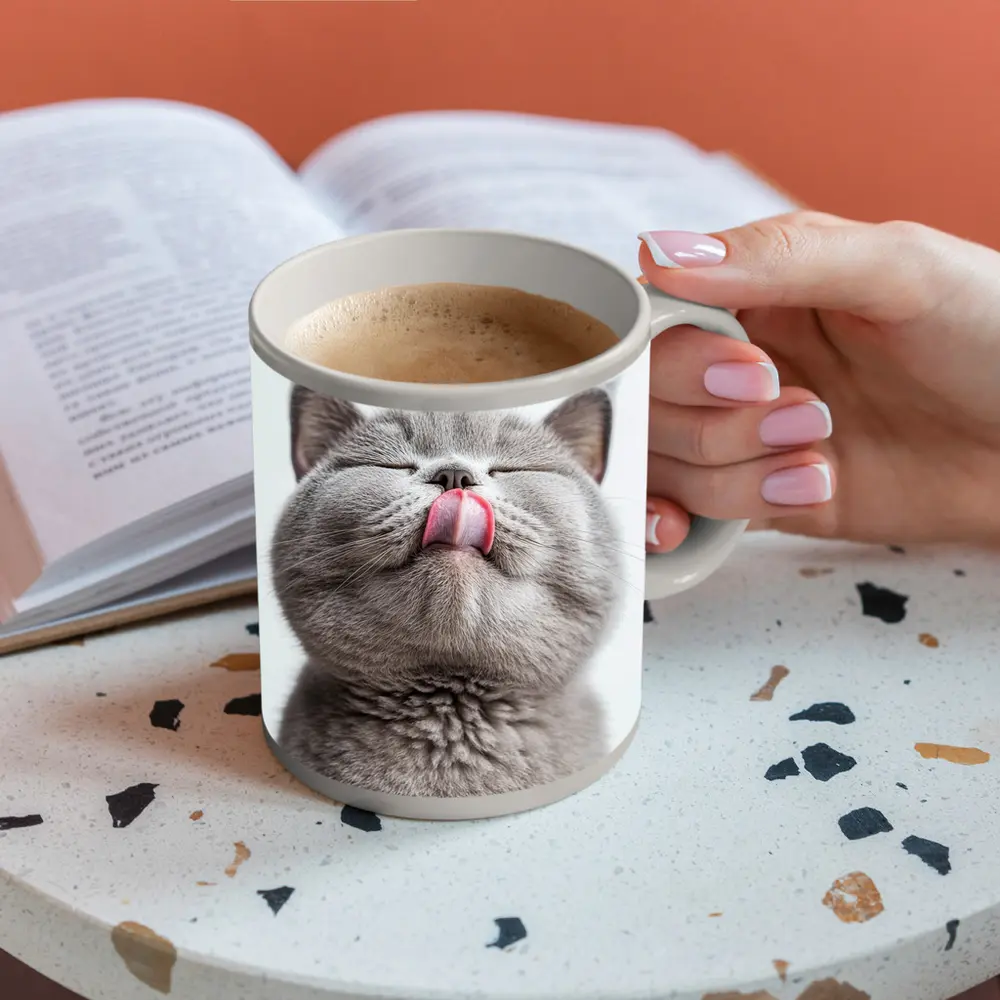 Gray British Shorthair Cat Licking Lips – Mugs