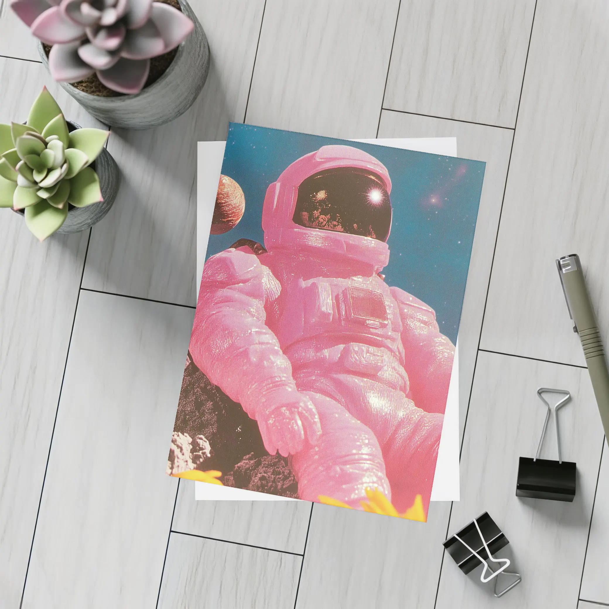 Pink Astronaut Sitting On Moon Surface – Postcards