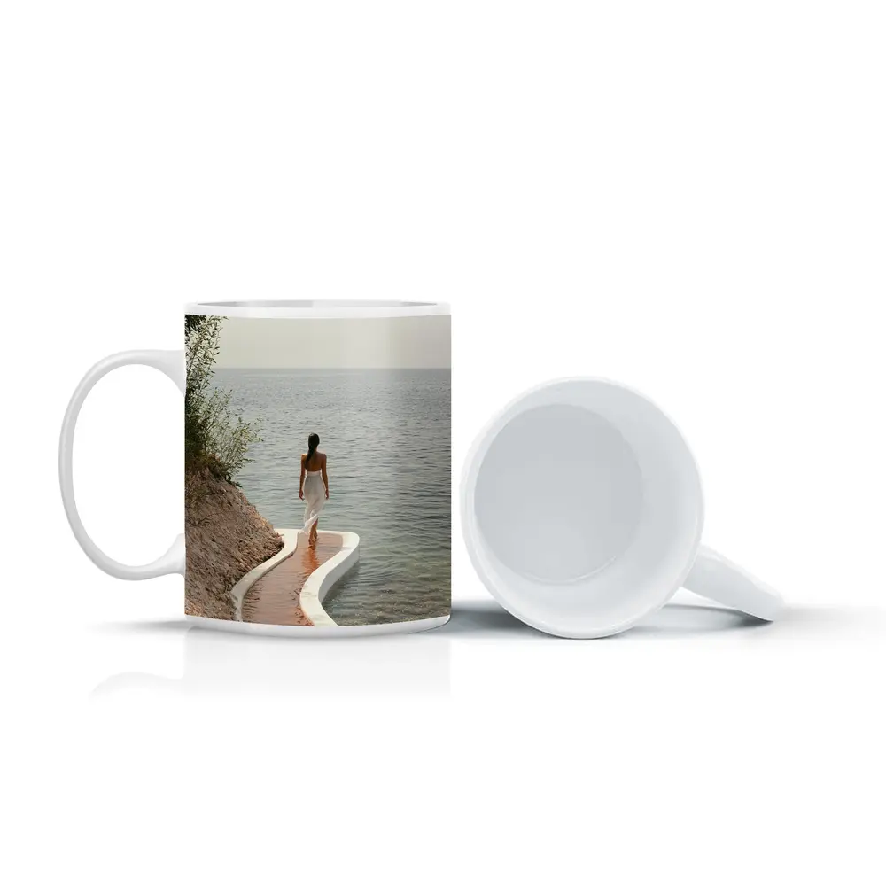 Woman Walking Curved Coastal Path Ocean View – Mugs