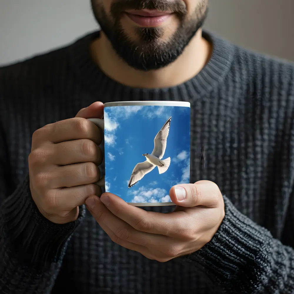 Seagull Flying Against Blue Cloudy Sky – Mugs