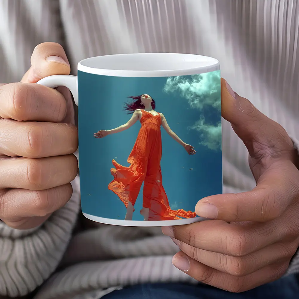 Woman Floating in Blue Sky Orange Dress – Mugs