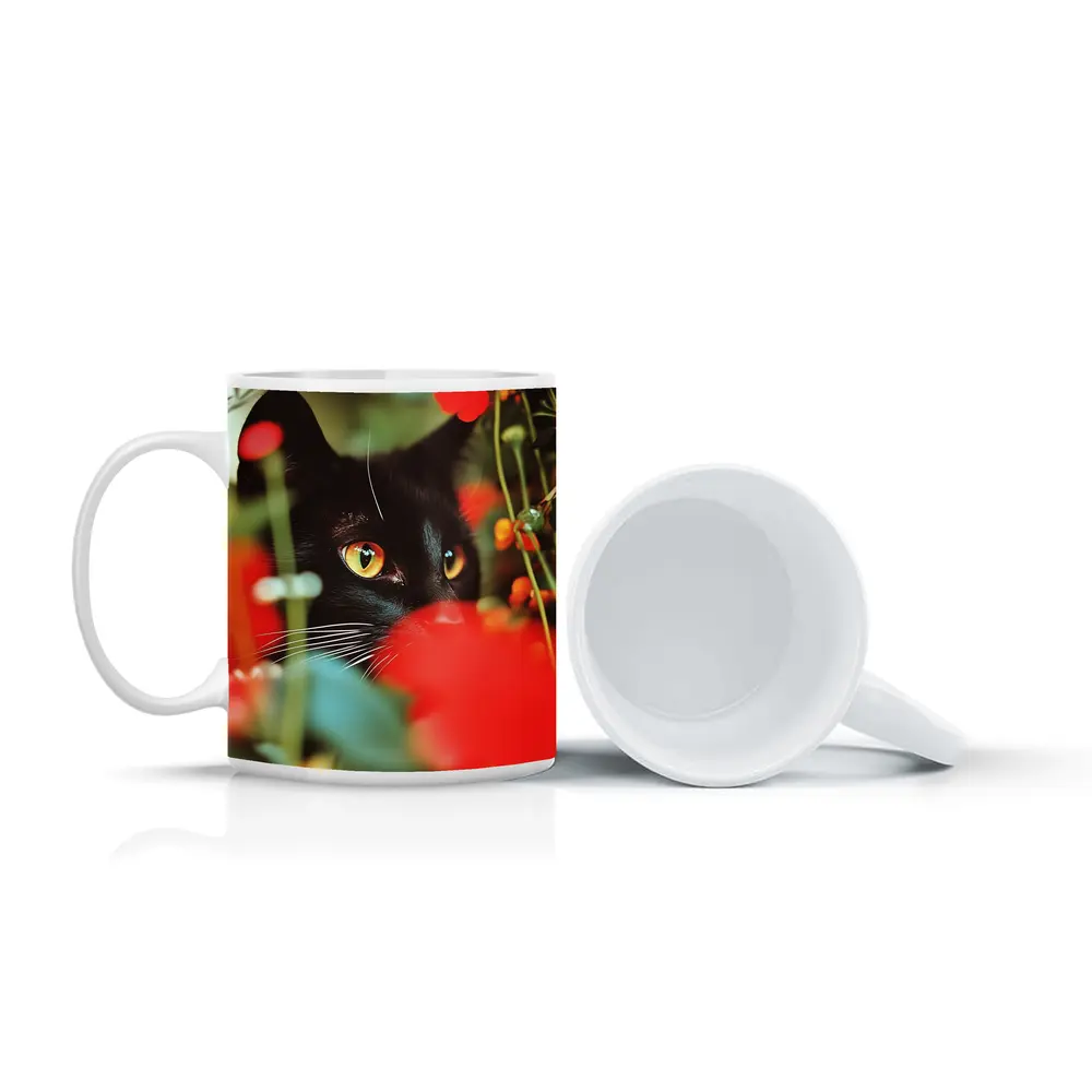 Black Cat Peeking Through Red Flowers – Mugs