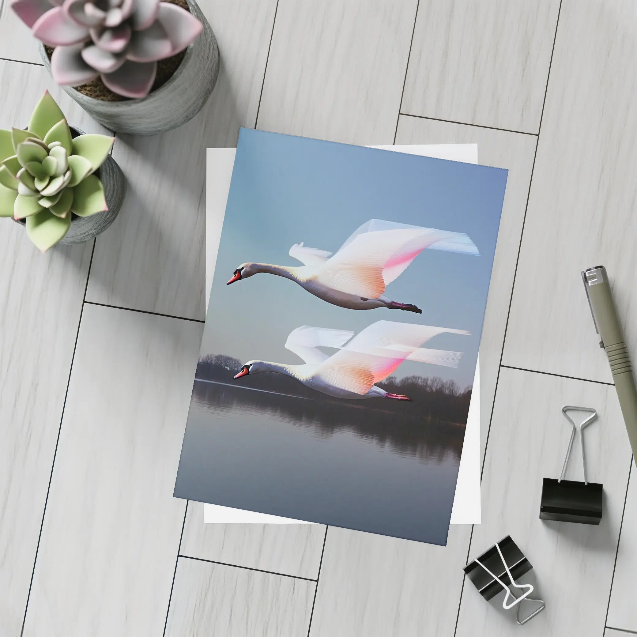Two Swans Flying Over Calm Lake – Postcards