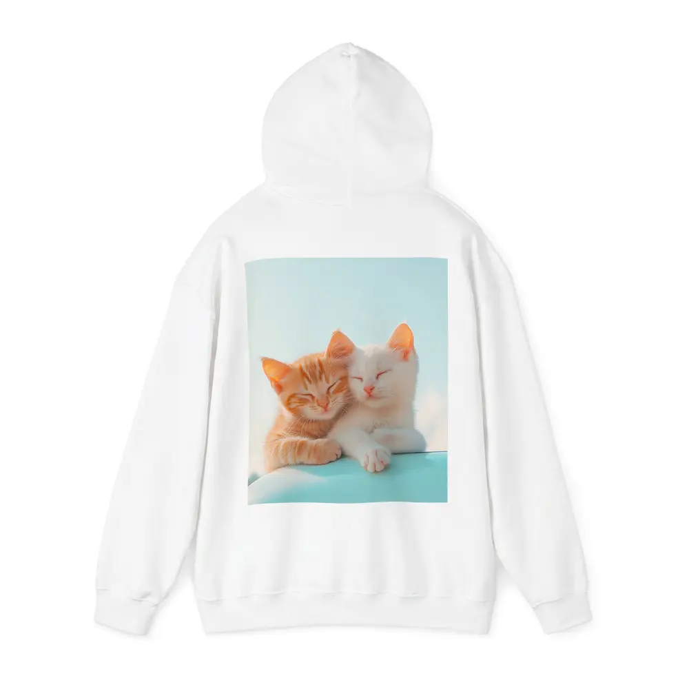 Two Kittens Cuddling Against Light Blue Sky – Hoodies