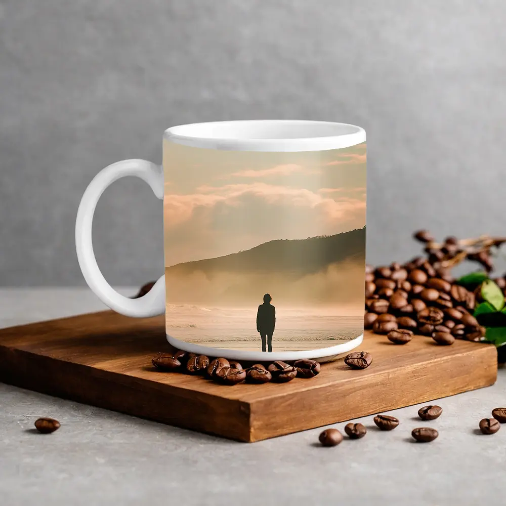 Lone Woman Standing On Misty Beach Shore – Mugs
