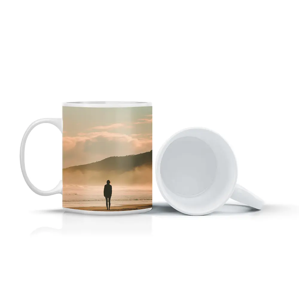Lone Woman Standing On Misty Beach Shore – Mugs