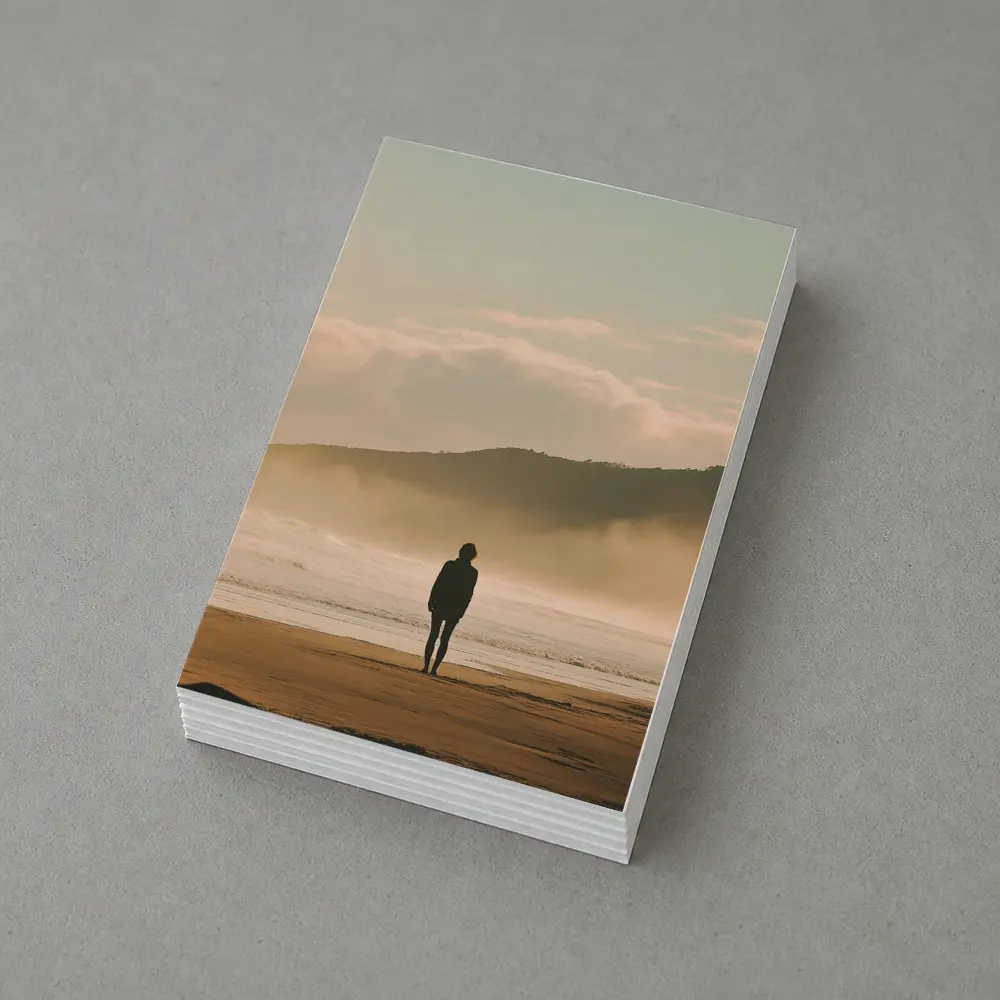 Lone Woman Standing On Misty Beach Shore – Postcards